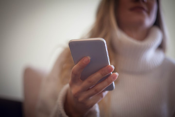 Using mobile phone.