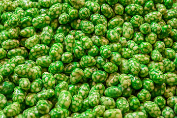 Fototapeta na wymiar Full frame shot of green candies ready to eat. Food photo from above