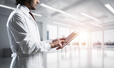 Fototapeta premium Medical industry concept by means of successful doctor