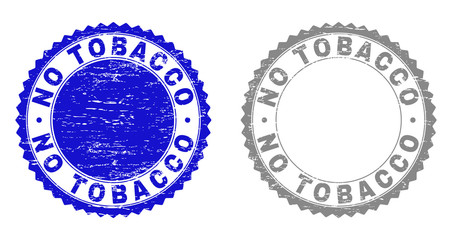 Grunge NO TOBACCO stamp seals isolated on a white background. Rosette seals with grunge texture in blue and grey colors. Vector rubber stamp imitation of NO TOBACCO title inside round rosette.