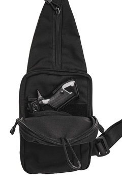 Tactical Shoulder With A Gun Inside The Bag On A White