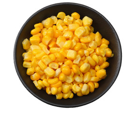 black bowl with canned corn kernels isolated on white background. top view