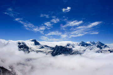 Fototapeta na wymiar In the mountains at cloud level