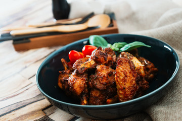 roasted sleeves chicken with potatoes and barbecue sauce