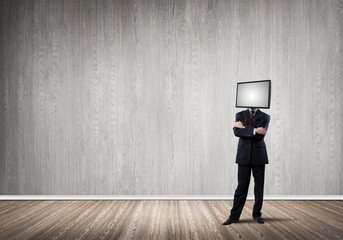 Businessman with TV instead of head.