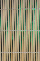 wooden sticks connected by cord