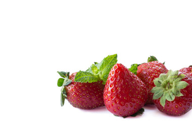 Strawberries on white background. Ripe strawberries close-up. Background berry. Sweet and juicy berry with copy space for text. Strawberry on white background. Various fresh summer berries.