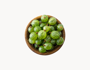Gooseberries fruits isolated on white background. Gooseberries in a bowl with copy space for text. Ripe gooseberry close-up. Background berry. Sweet and juicy berry. Top view.