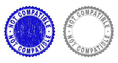 Grunge NOT COMPATIBLE stamp seals isolated on a white background. Rosette seals with grunge texture in blue and grey colors. Vector rubber stamp imitation of NOT COMPATIBLE text inside round rosette.