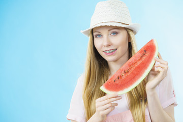 woman holding watermelon fruit