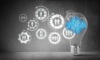 Cloud from gears inside lightbulb.