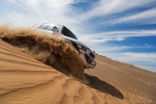 Freeze motion of four wheel drive through the desert in the United Arab Emirates.