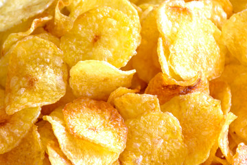 Closeup of plate with several chips potatoes ready to be served