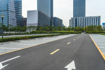empty car park with downtown city space background