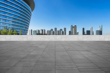 Panoramic skyline and buildings with empty square floo