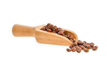 Nuts isolated in wood scoop on white background