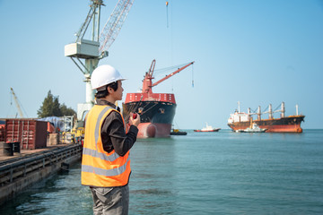 loading master, stevedore in charge on the loading discharging operation in port terminal, sea...