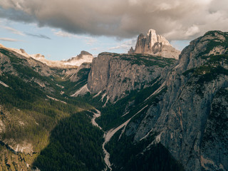 Aerial drone shot of massiv mountains in the Dolomites within the italian Alps