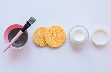 Clay mask for face and body. Dead sea mud mask - beauty products ingredients on light background, top view. Beauty concept. Flat lay. closeup texture of blue facial clay, copy space.homemade cosmetics