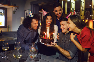 Group Of Friends Celebrating Birthday At Home