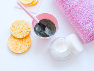 Clay mask for face and body. Dead sea mud mask - beauty products ingredients on light background, top view. Beauty concept. Flat lay. closeup texture of blue facial clay, copy space.homemade cosmetics