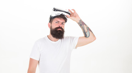 Man wearing virtual reality goggles in white background. Funny man experiencing 3D gadget technology - close up. VR headset.