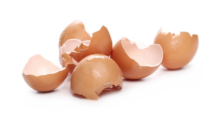 Cracked egg shells isolated on white background
