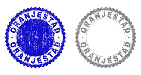 Grunge ORANJESTAD stamps isolated on a white background. Rosette seals with grunge texture in blue and gray colors. Vector rubber stamp imitation of ORANJESTAD label inside round rosette.