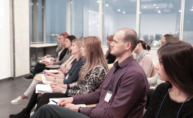 group of business people at a seminar in the modern office