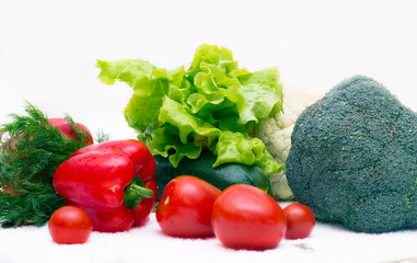 Various vegetables close to a white background