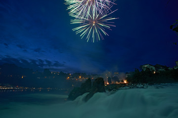 Amazing fireworks display high up in the Swiss mountains celebration Swiss national day in Schaffhausen the place where the river Rheine has its origin