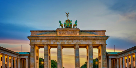 Brandenburg gate illuminated at sunset , Berlin, Germany © Delphotostock