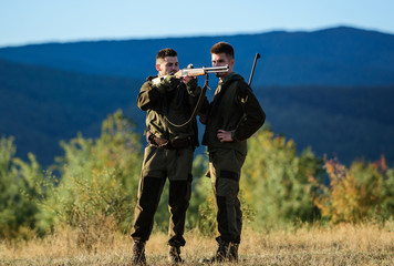 Hunting skills and weapon equipment. How turn hunting into hobby. Friendship of men hunters. Army...