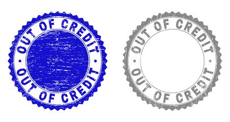 Grunge OUT OF CREDIT stamp seals isolated on a white background. Rosette seals with grunge texture in blue and grey colors. Vector rubber stamp imitation of OUT OF CREDIT tag inside round rosette.