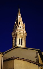 Fototapeta na wymiar Bell tower of Badia Fiorentina at night, Florence, Italy