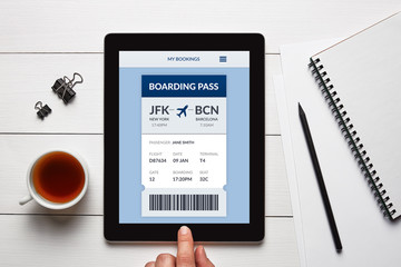 Boarding pass concept on tablet screen