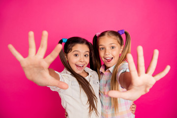 Close up photo two small little age she her girls hands arms palms counting fingers math lesson...