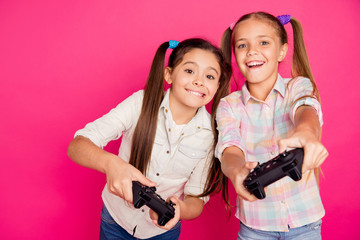 Close up photo two people little age she her girls hold hands arms trying hard to win game not lose...