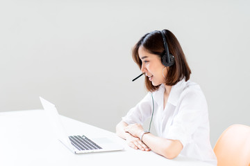 Young woman use headset for teleconference