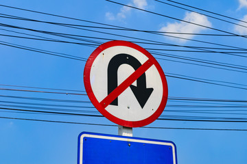 A direction sign, turn around prohibit.