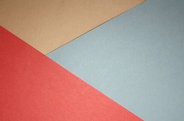 Colored tricolore brown indigo blue red papers background cardboards