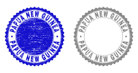 Grunge PAPUA NEW GUINEA stamp seals isolated on a white background. Rosette seals with grunge texture in blue and gray colors.