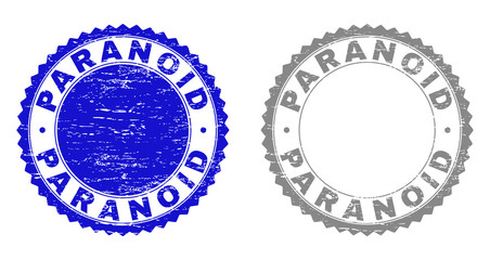 Grunge PARANOID stamps isolated on a white background. Rosette seals with grunge texture in blue and gray colors. Vector rubber stamp imprint of PARANOID label inside round rosette.