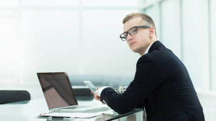 responsible businessman works in a modern office