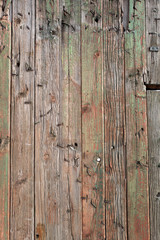 Rough wooden structure of old boards with different shades of color