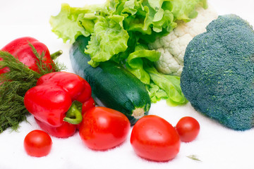 Various vegetables close to a white background