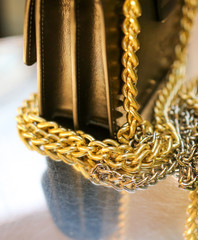 Gold chain on the bag