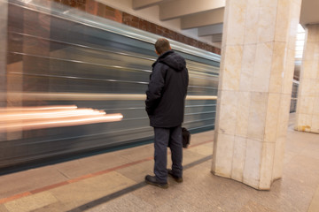 The train moves to the subway as a background