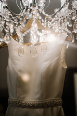 Beautiful tender wedding dress on wedding day close up