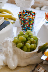 Variety of candies, cakes and cupcakes at the candy bar
